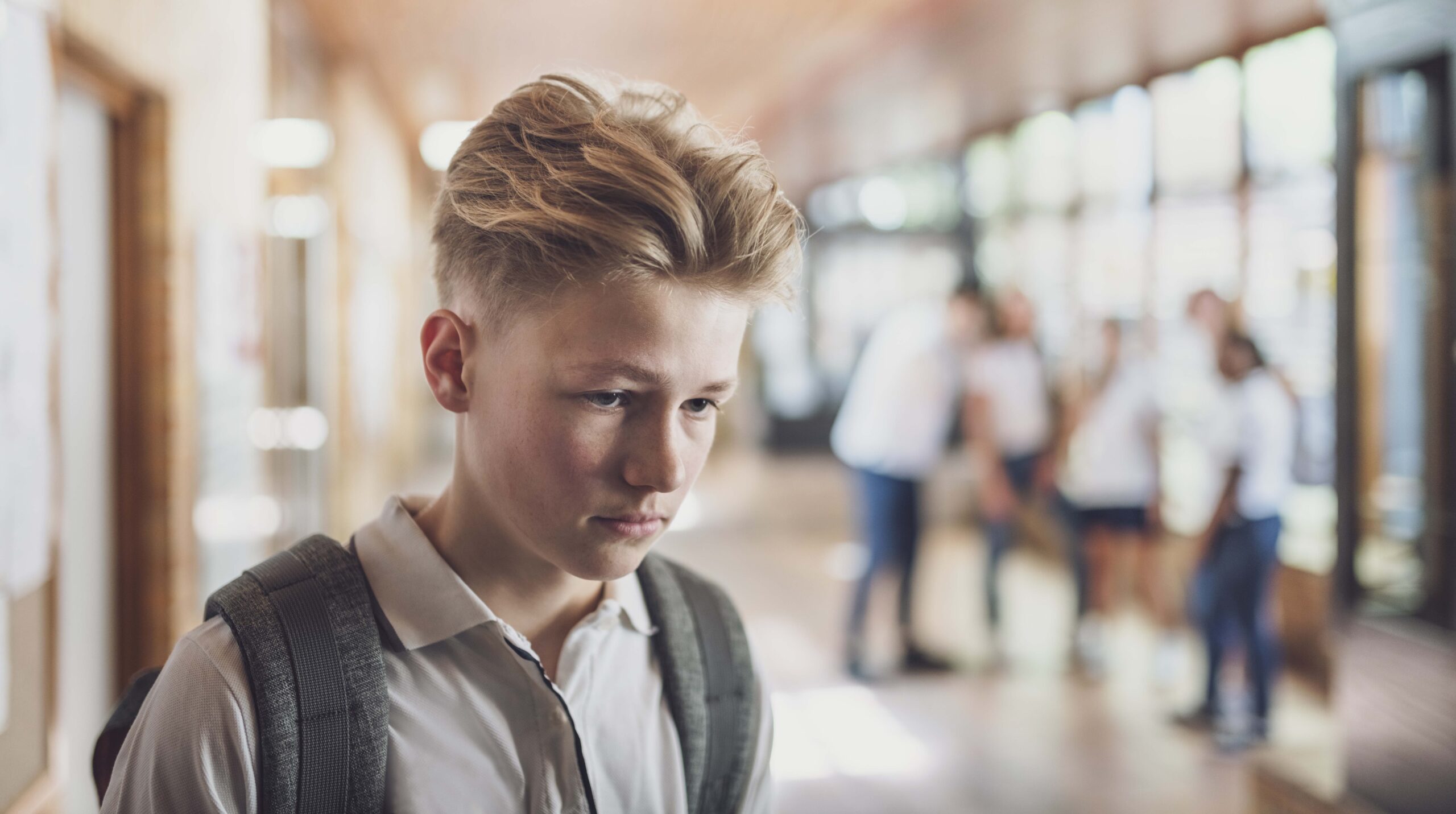 Student being bullied by classmates in school