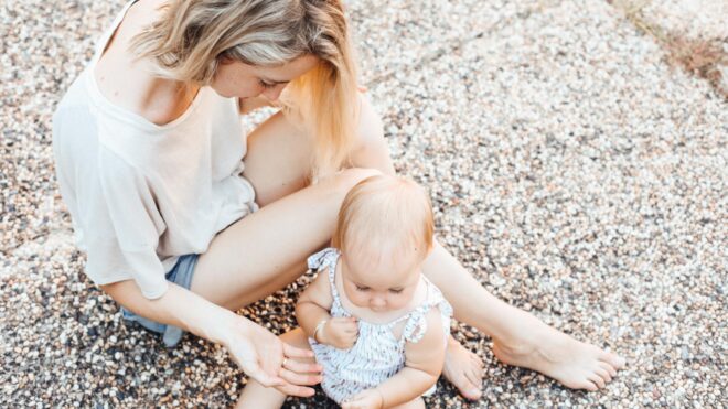 mom-sitting-ground-baby
