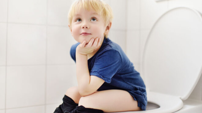kid-sitting-potty