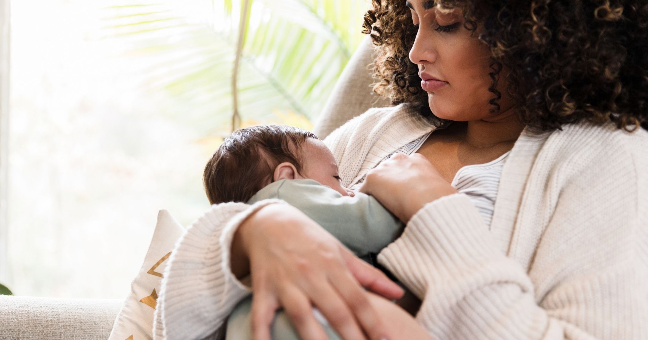 mom breastfeeding baby