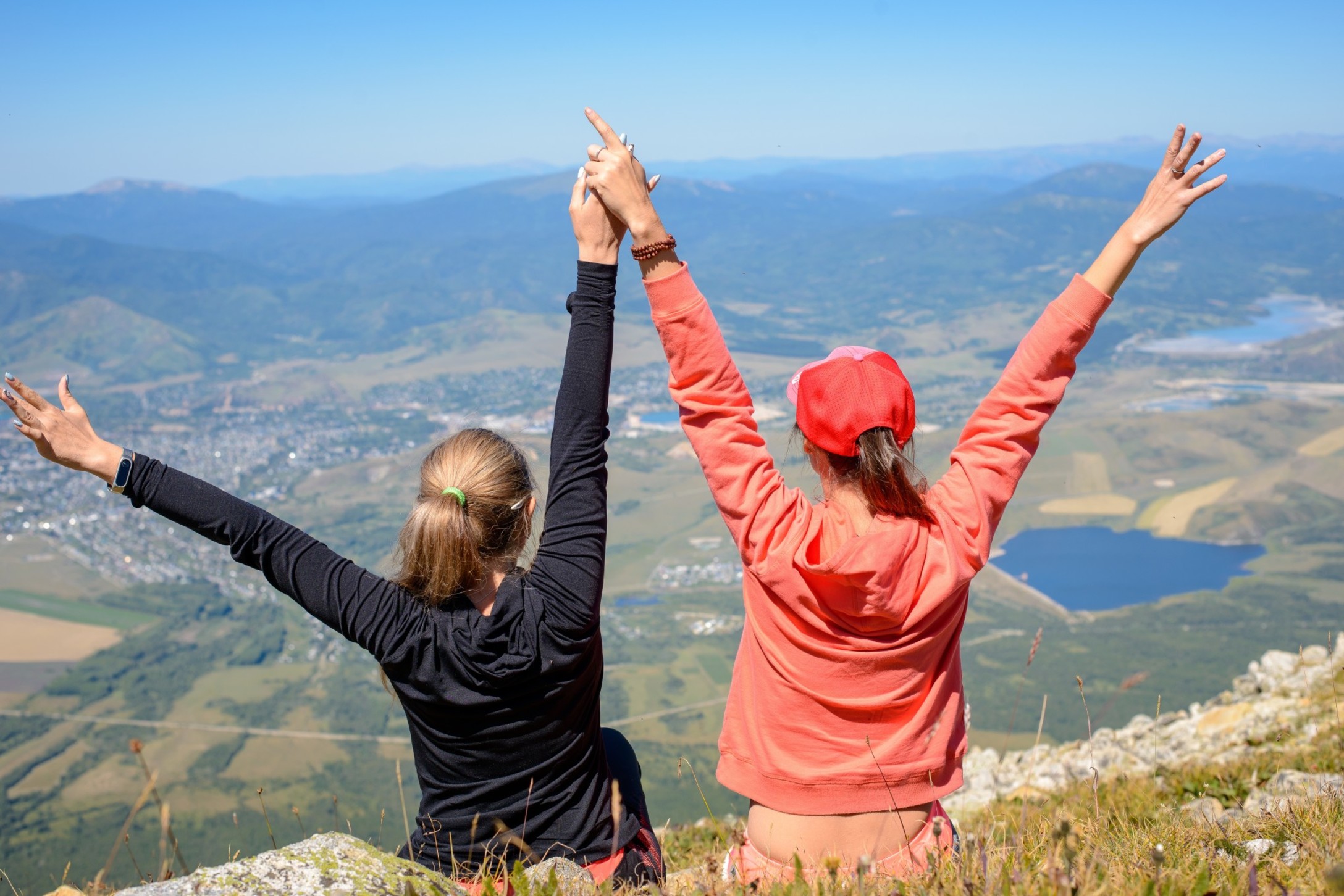 nominated-two-women-in-the-mountains-talking-people-from-behind-millennials-healthy-lifestyle-nature t20 gonkJb