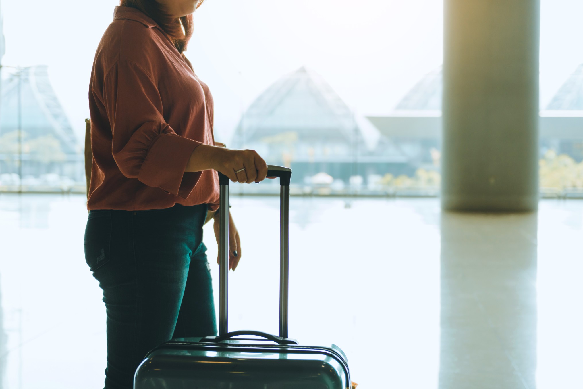 woman-suitcase-airport