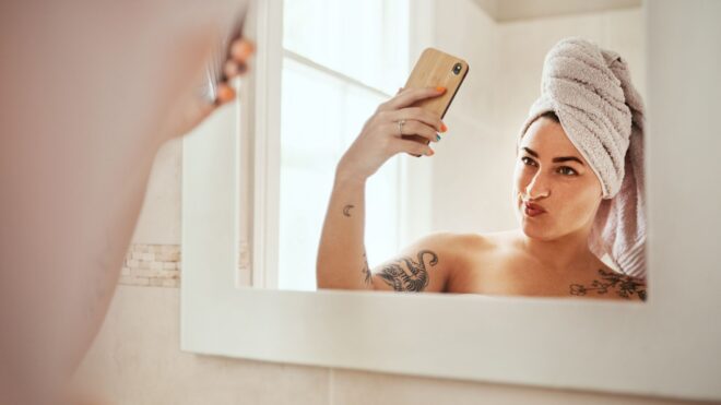 woman mirror selfie out of shower