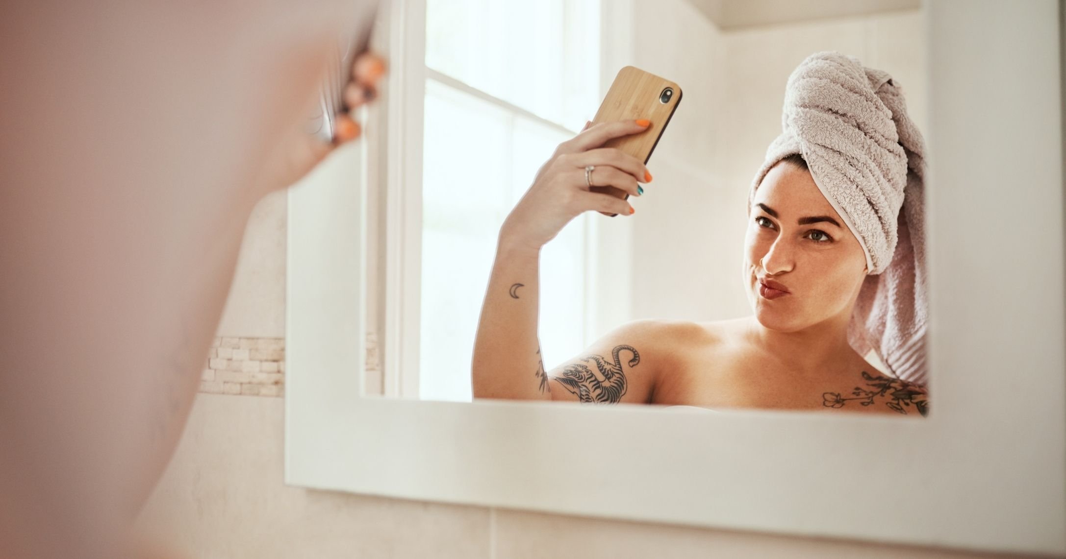 woman mirror selfie out of shower