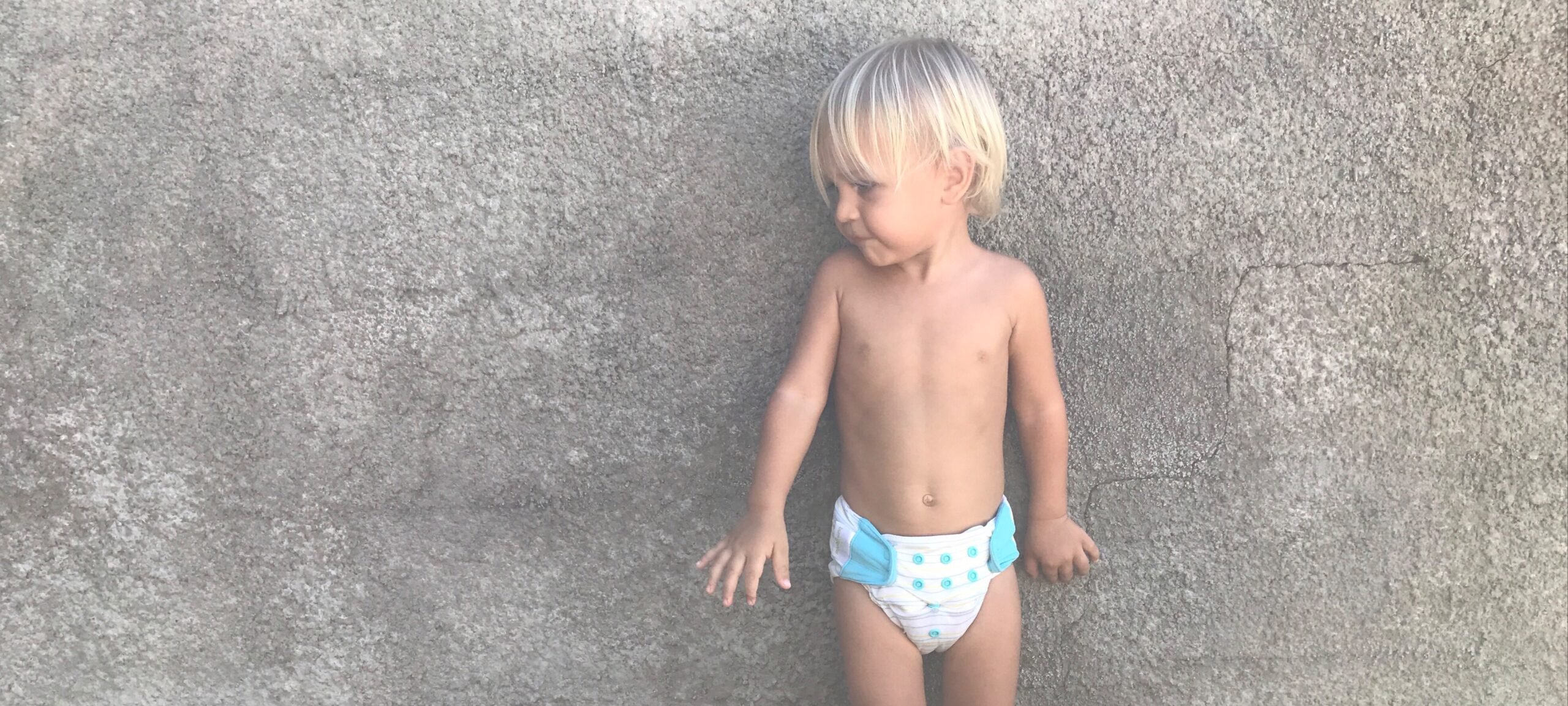 Little boy wearing pull-ups training pants
