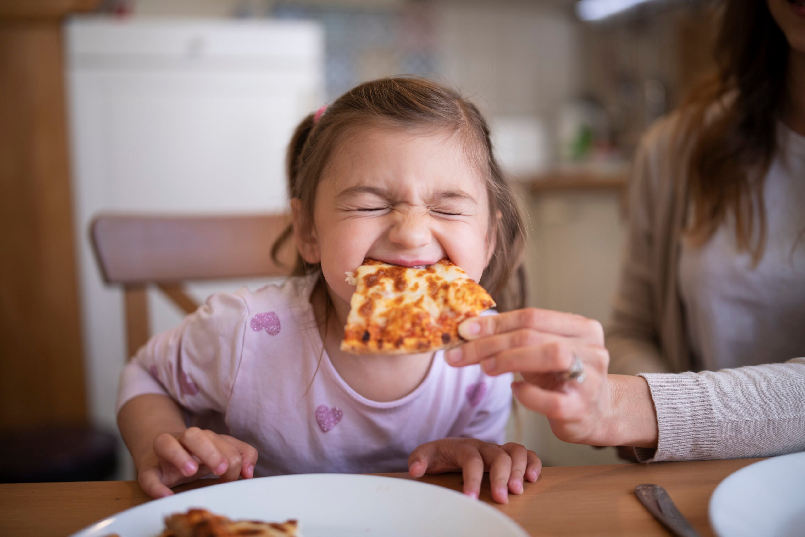 Cute Girl Eating Pizza