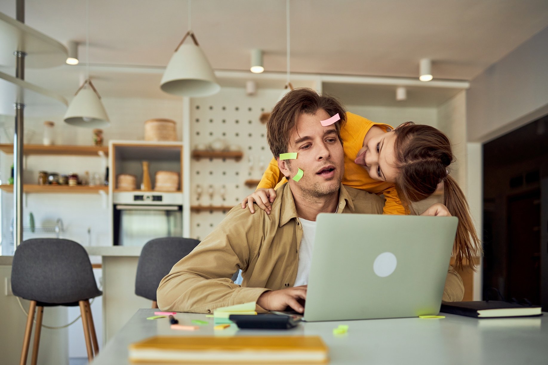 Dad is home alone with kids who are making a mess.