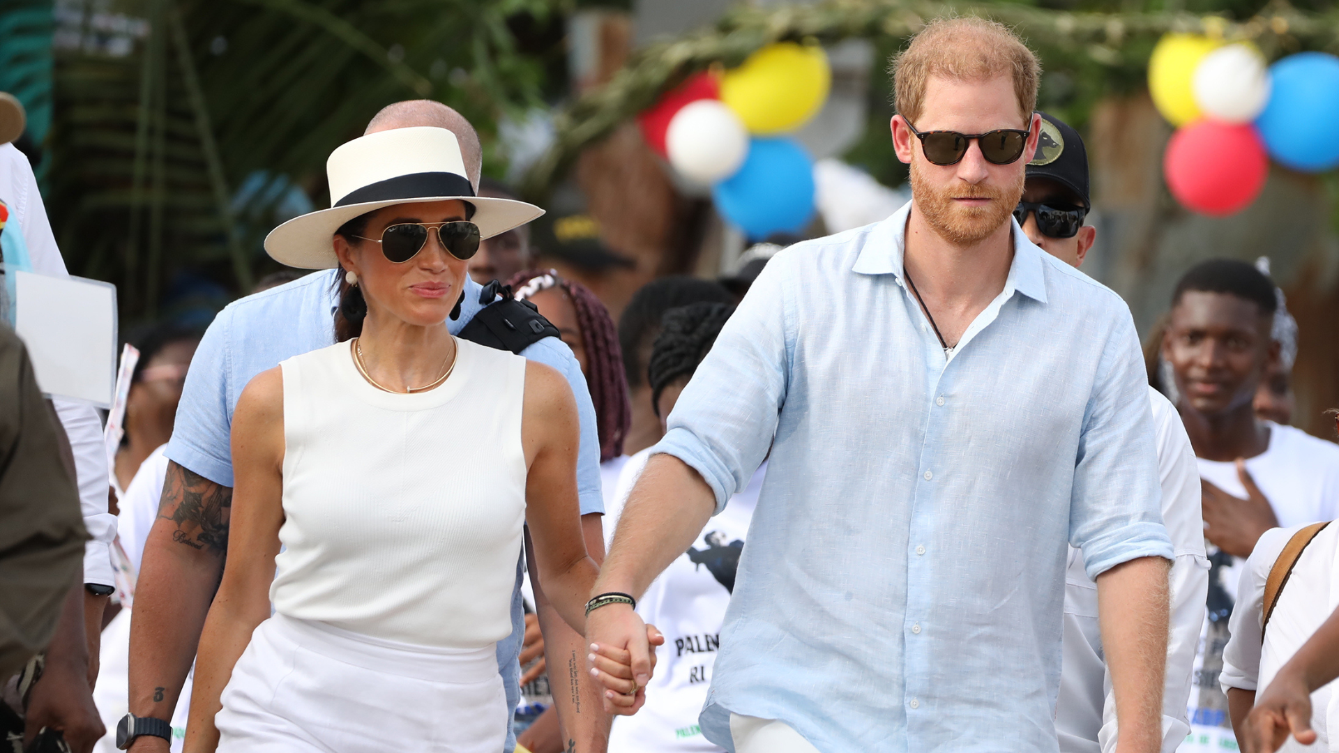 Prince Harry, Duke of Sussex, right, and Meghan, Duchess of Sussex