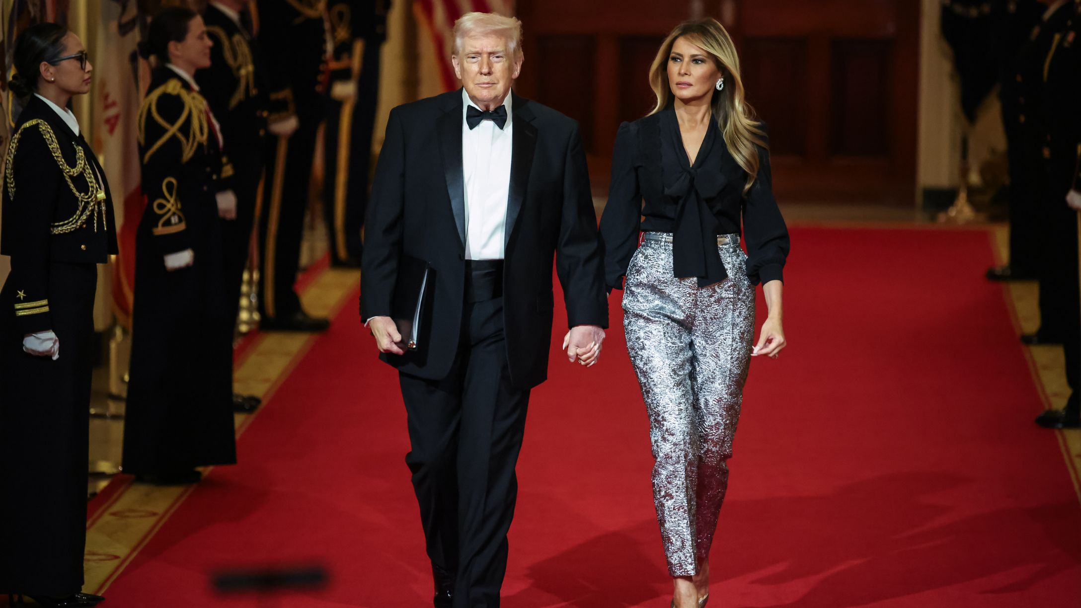 US President Donald Trump and First Lady Melania Trump arrive at the Governor’s Dinner at the White House on Feb. 21, 2026