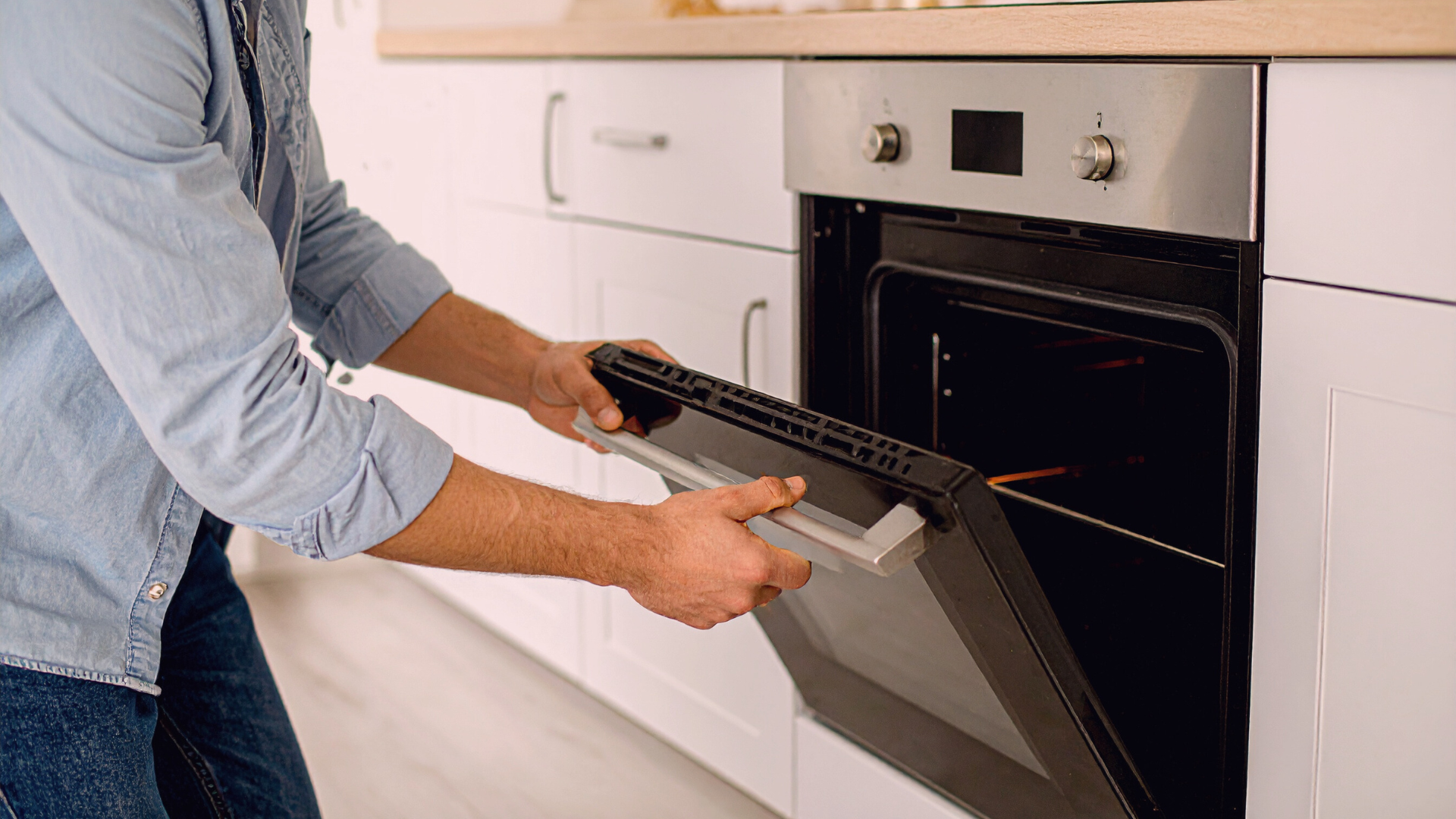 man opening the oven
