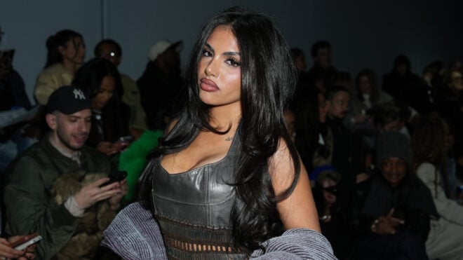 Huda Mustafa attends the Jane Wade fashion show