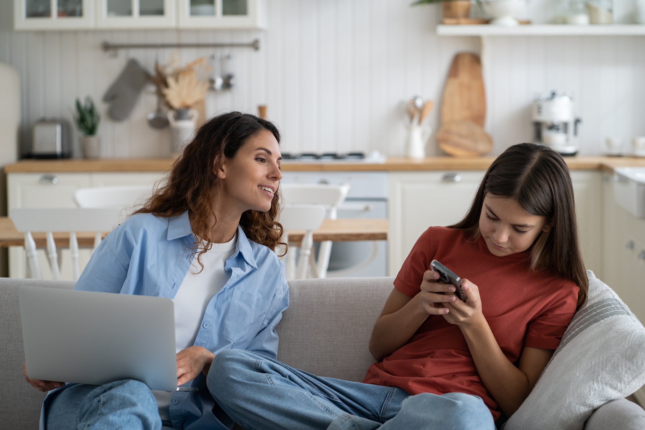 Curious European mother invades teenage daughter privacy by wanting to look at SMS on mobile phone